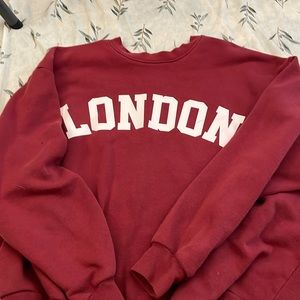 A large pinkish sweatshirt!